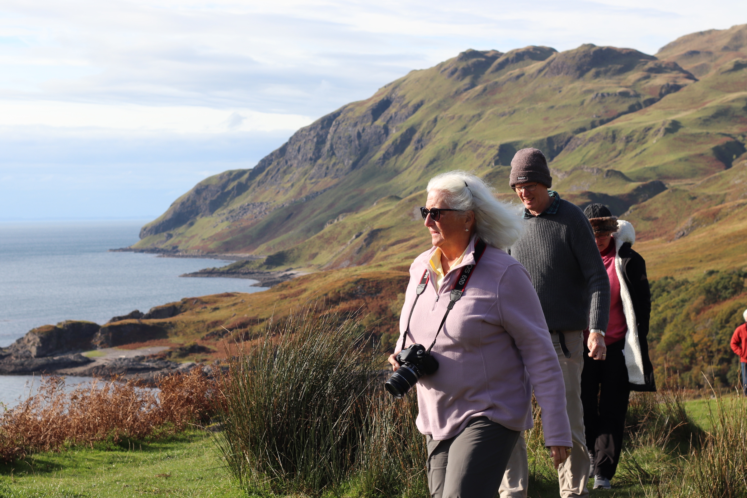 group of passengers walking in scotland