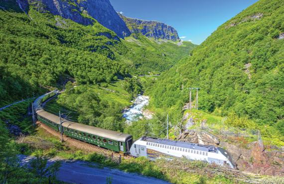 The Flåm Railway traveling through the Fjords in Norway.