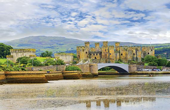 A view of Conwy Castle with the river in view.