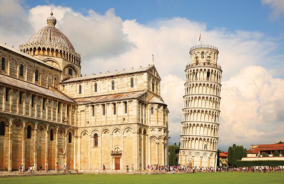 A view of the iconic Leaning Tower of Pisa beside the Pisa Cathedral.