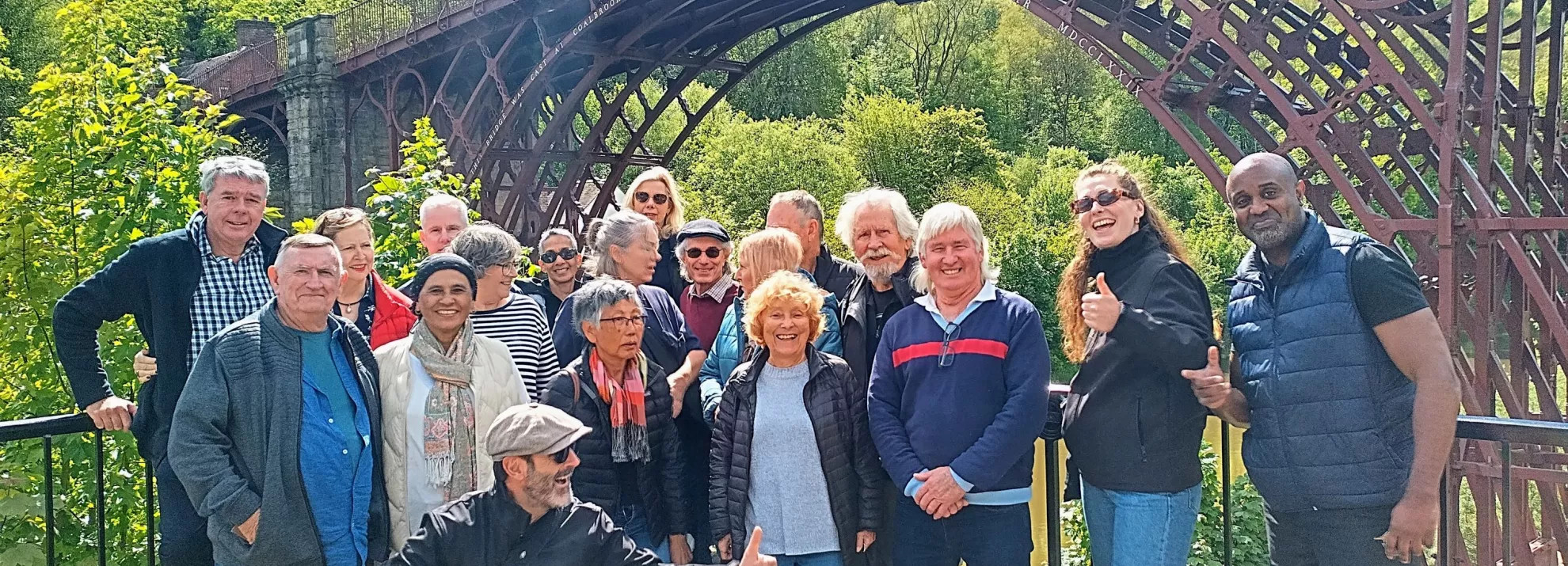 Group of backroads tourist taken photo near the Iron bridge
