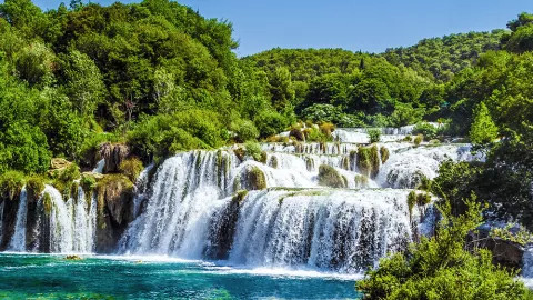 Streams of water flow down the iconic waterfalls of Krkr National Park.