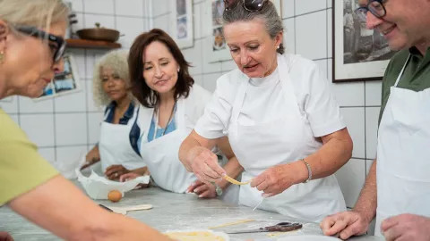 Guests enjoying a cooking class at Antico Borgo Di Tabiano Castello.