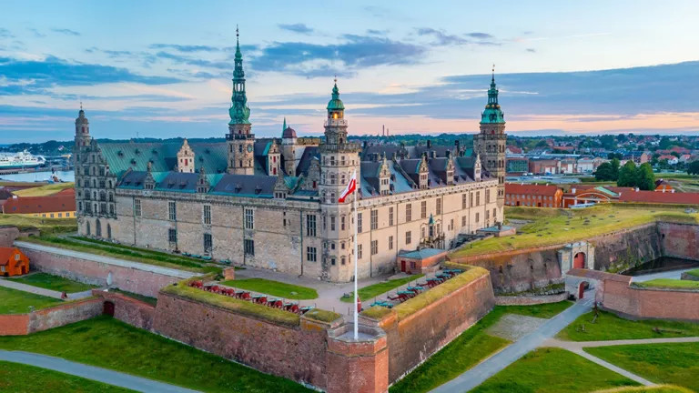 A landscape view of the grand Kronborg Castle in Helsingør, Denmark. 