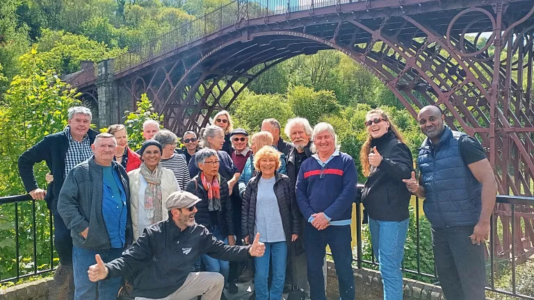 Group of backroads tourist taken photo near the Iron bridge