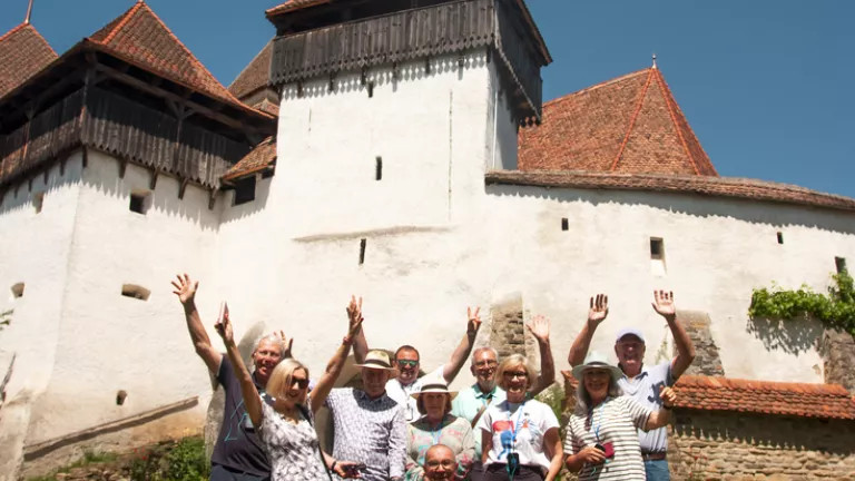 A group standing outside the Viscri Fortified church