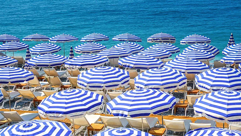 View of umbrellas on beach on the French Riviera