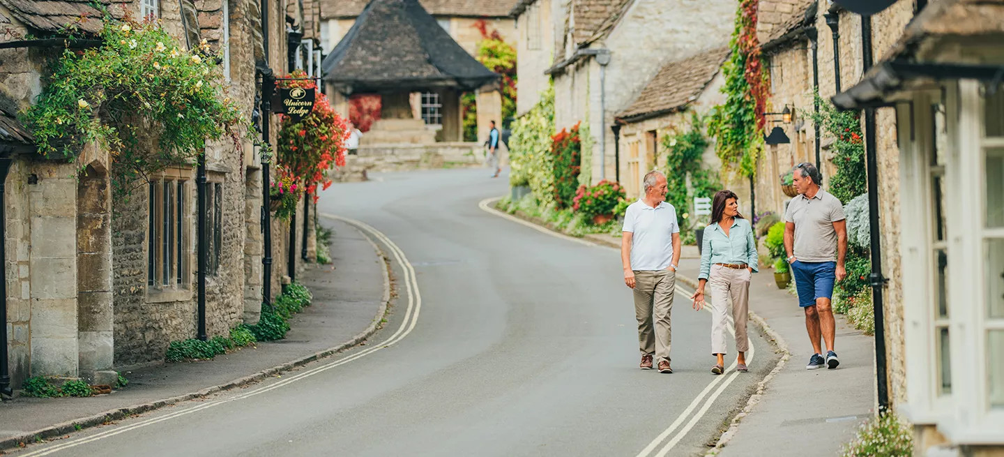 Guests walking the quaint streets of the Cotswolds.