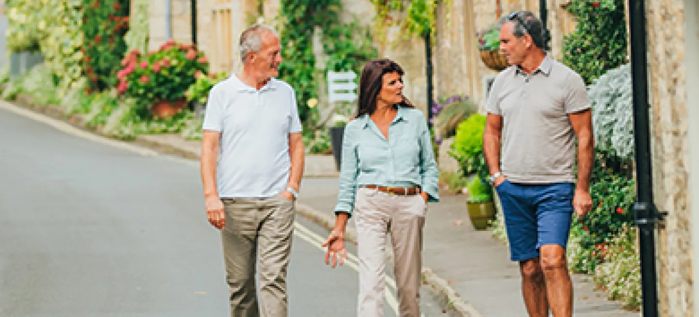 Guests walking the quaint streets of the Cotswolds.