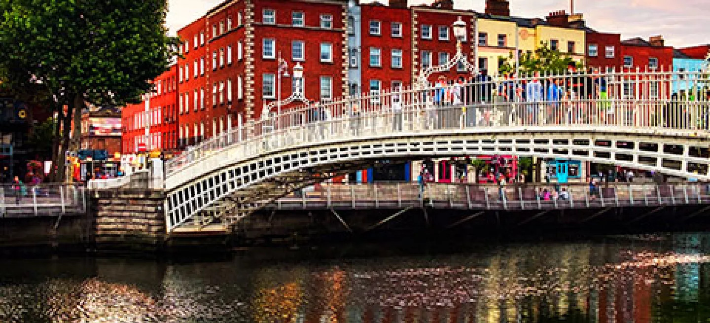 View of the Ha’penny Bridge across the river Liffey in Dublin