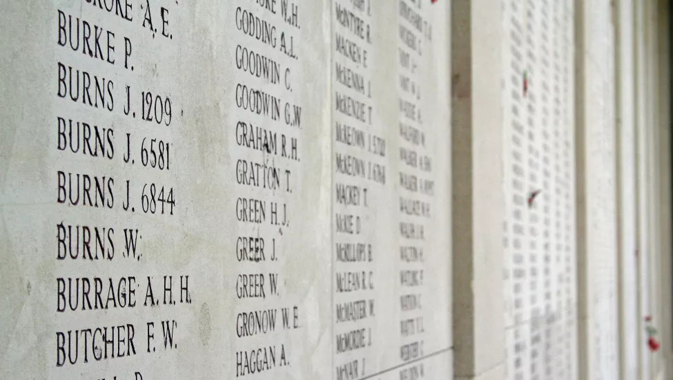 Close up shot of a WW1 memorial in France, detailing the names of lost soldiers.